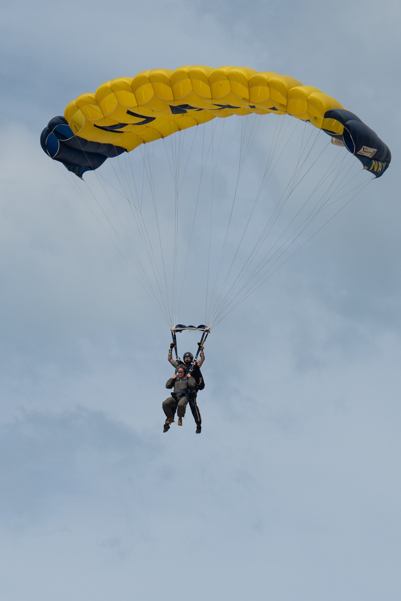U.S. Air Force Lt. Col. Heather Huot, 313th Airlift Squadron pilot, tandem jumps strapped to a U.S. Navy Parachute Team member during the Pacific Airshow Gold Coast in Gold Coast, Australia, on Aug. 16th, 2024.