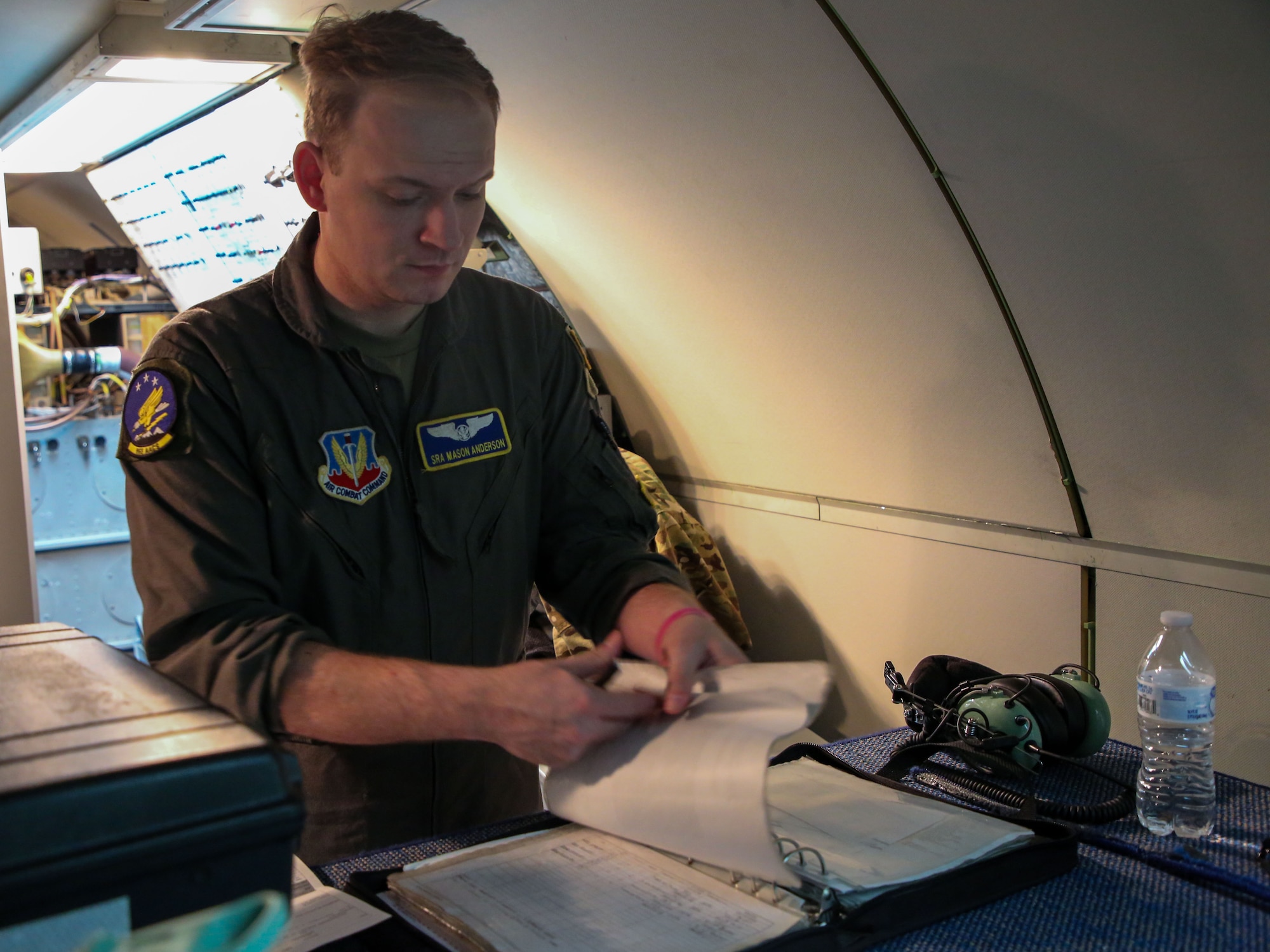 Senior Airman Mason Anderson, an airborne data systems technician from the 965th Airborne Air Control Squadron, conducts preflight checks onboard an E-3 Sentry during Bamboo Eagle 24-3 at Nellis Air Force Base, Nev., Aug. 8, 2024. The 965th AACS is pivotal in maintaining data integrity and system functionality, ensuring the E-3’s operational readiness for this large-scale exercise. (U.S. Air Force photo by Garrett N. Cole)