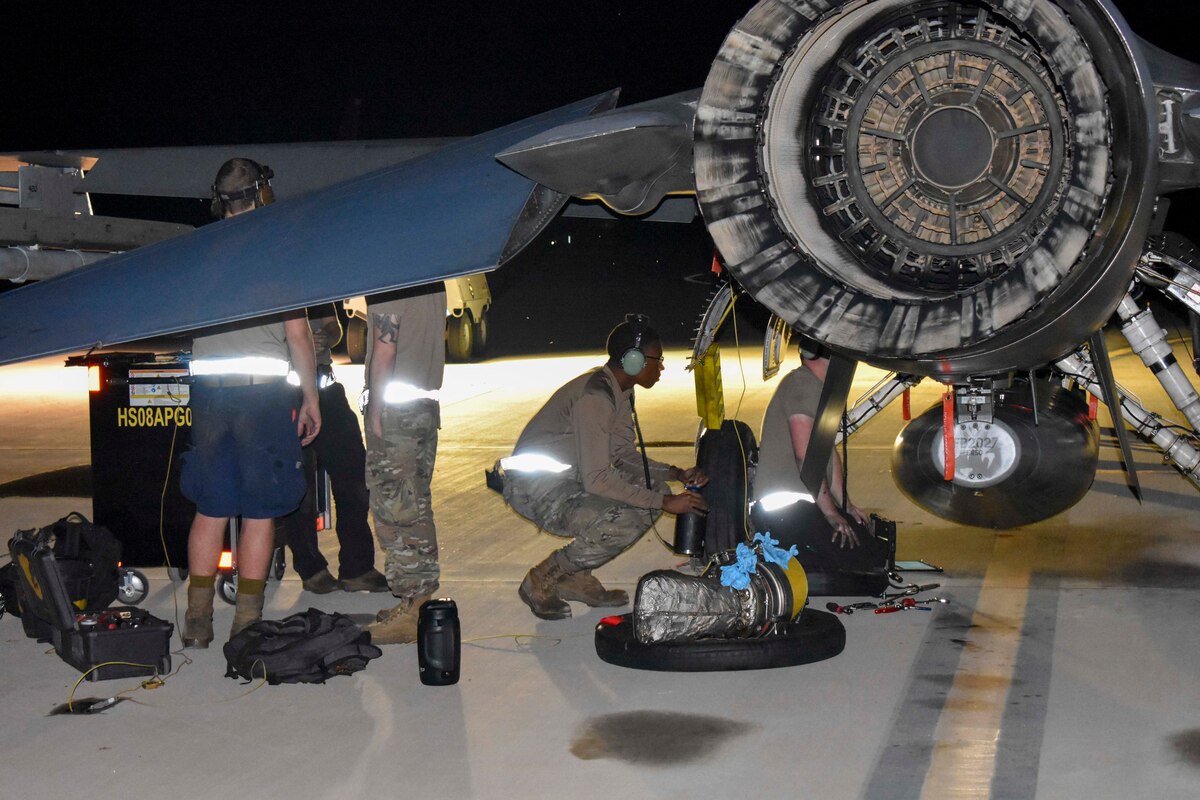 Airmen of the 49th Maintenance Group replace jet fuel starter on an F-16 Viper during Project Iron Agility at Holloman Air Force Base, New Mexico, Aug. 13, 2024. The maintenance knowledge curriculum taught at PIA implements training tactics and procedures to prepare Airmen for deployment scenarios. (Courtesy photo)