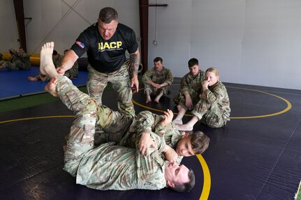 Approximately 30 U.S. Army Soldiers with the Pennsylvania National Guard participate in a five-day Army Combatives training program August 12-16 at Fort Indiantown Gap. Army Combatives trains leaders and Soldiers in close quarters combat to instill the Warrior Ethos and prepare Soldiers to defeat the enemy in hand-to-hand combat. (U.S. Army National Guard photo by Sgt. 1st Class Zane Craig)