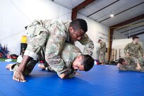 Approximately 30 U.S. Army Soldiers with the Pennsylvania National Guard participate in a five-day Army Combatives training program August 12-16 at Fort Indiantown Gap. Army Combatives trains leaders and Soldiers in close quarters combat to instill the Warrior Ethos and prepare Soldiers to defeat the enemy in hand-to-hand combat. (U.S. Army National Guard photo by Sgt. 1st Class Zane Craig)