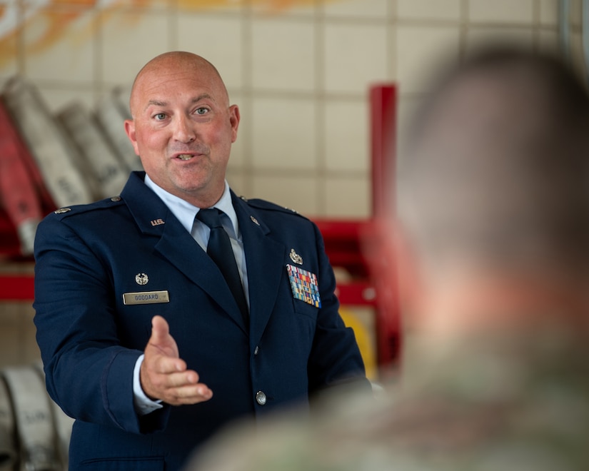 Lt. Col. Jarret Goddard, commander of the 123rd Civil Engineer Squadron, speaks at the retirement ceremony of Chief Master Sgt. Anthony Schmidt, fire chief for the 123rd Fire and Emergency Flight, at the Kentucky Air National Guard Base in Louisville, Ky., July 19, 2024. Schmidt is retiring after more than 37 years of service to the Kentucky Air National Guard. (U.S. Air National Guard photo by Master Sgt. Joshua Horton)