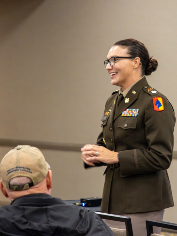 Lt. Col. Dayna Sanders speaks to municipality representatives during the Local Issues Conference in Louisville