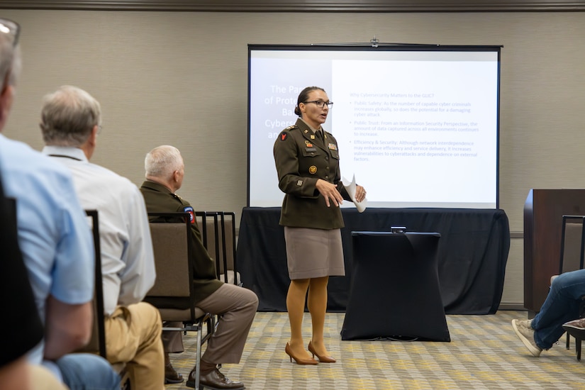 Lt. Col. Dayna Sanders speaks to municipality representatives during the Governor's Local Issues Conference