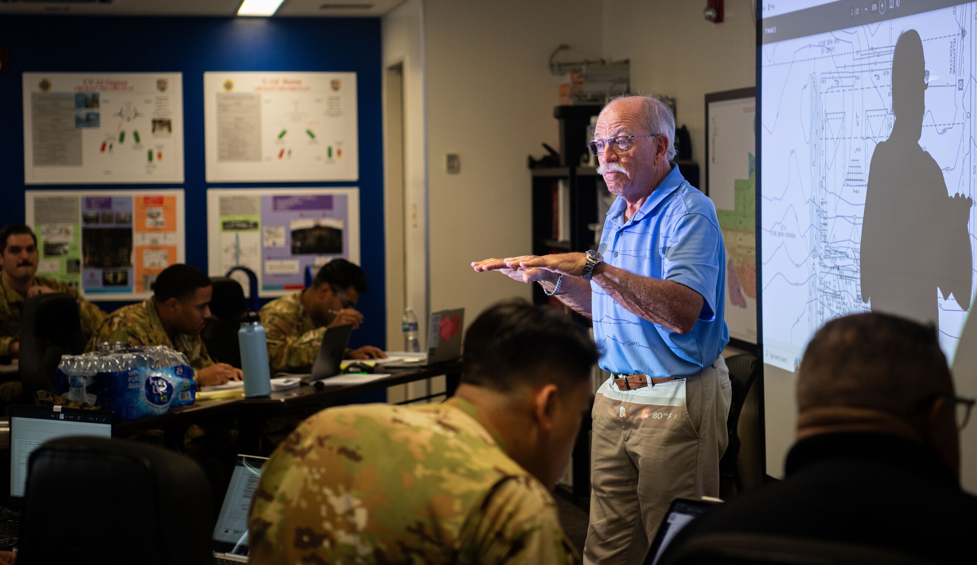 A instructor instructs the Plans Examiner Course.