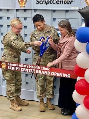 Kenner Army Health Clinic leadership standing in front of the ScriptCenter.