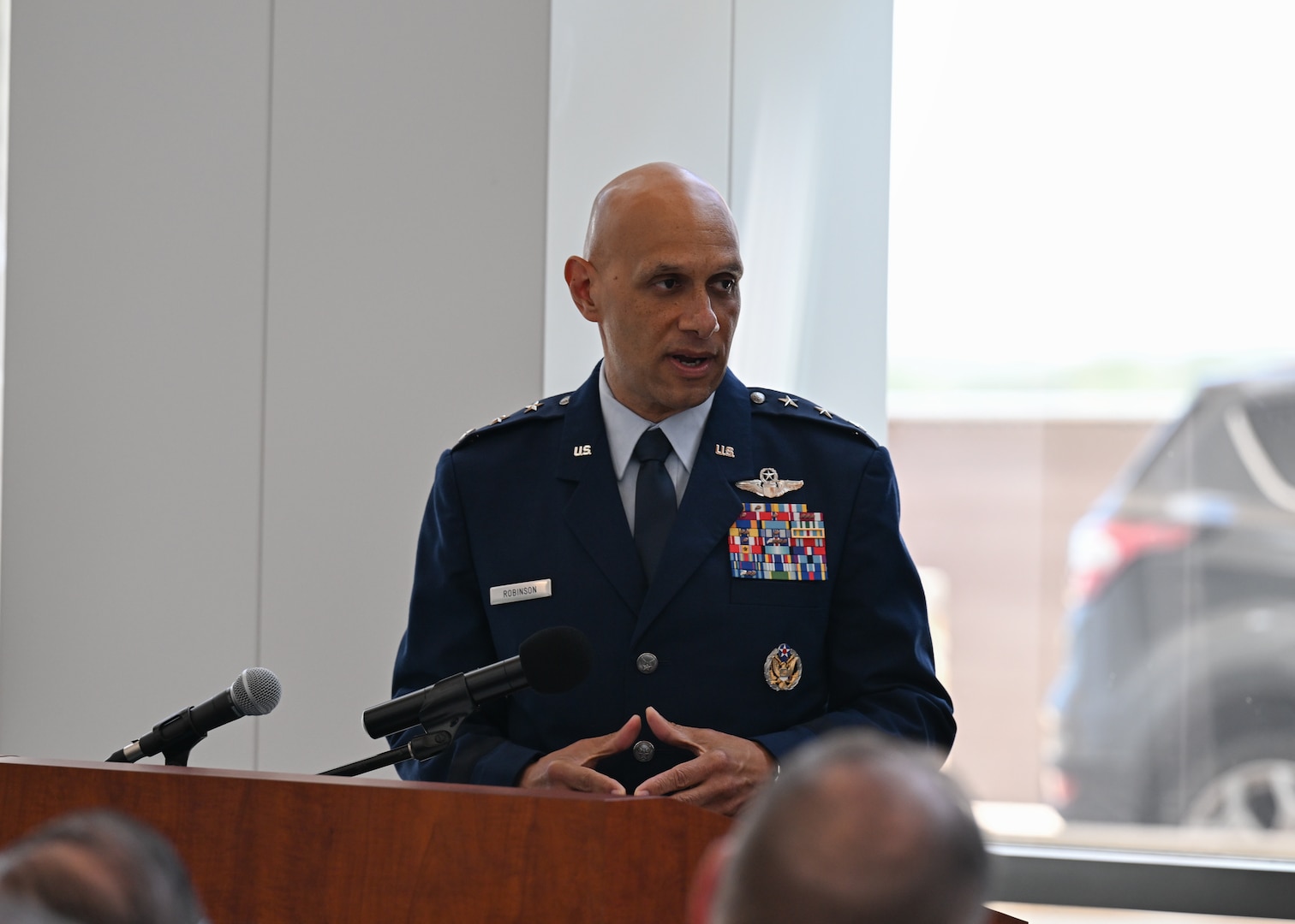 U.S. Air Force Lt. Gen. Brian S. Robinson, Air Education Training Command commander, speaks at the 59th Medical Wing change of command ceremony at Joint Base San Antonio Lackland, Tx., Aug. 23, 2024.