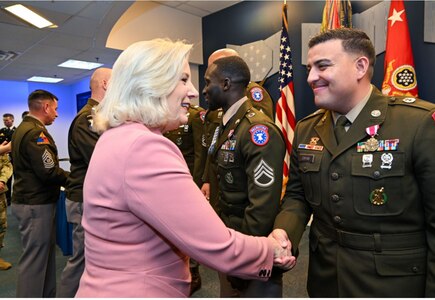 U.S. Army Soldier shakes hands with Secretary of the Army, Honorable Christine Wormuth