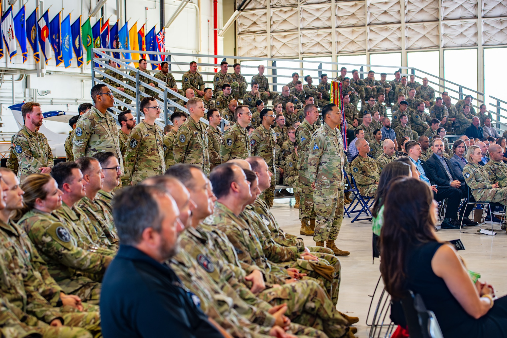 Guardians and Airmen stand in formation for the DEL 6 change of command ceremony.