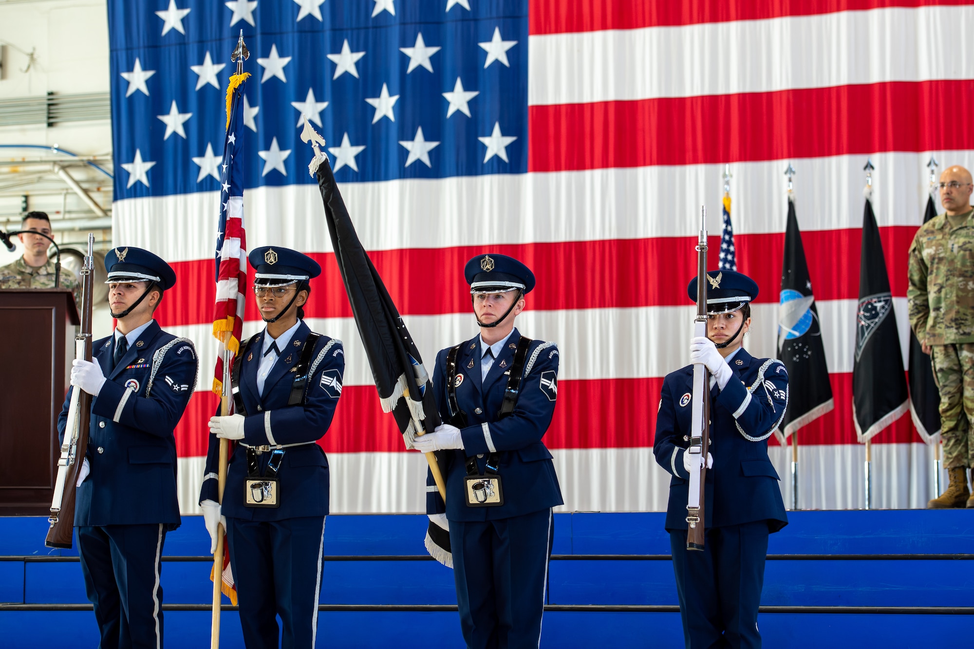 Members of the 21st Force Support Squadron Honor Guard present the colors at the Delta 6 - Space Access and Cyberspace Operations change of command ceremony.