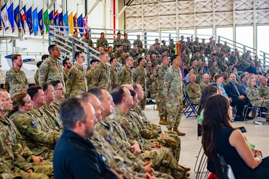  Guardians and Airmen stand in formation for the DEL 6 change of command ceremony.