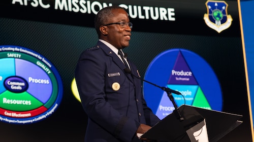 Man speaking at podium
