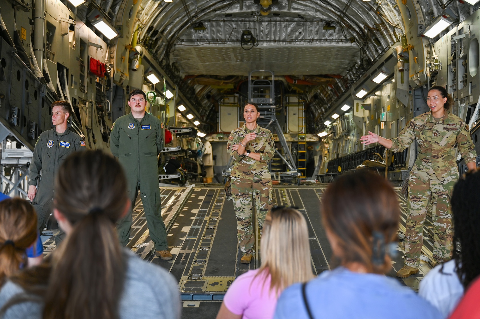 Members of the 445th Aeromedical Evacuation squadron greet potential recruits participating in the Aug. 3, 2024 445th Airlift Wing’s Health Professions Recruiting event, before they board a C-17 Globemaster III configured as a flying hospital. The potential flight doctors and flight nurses also received information on the benefits of being a Reservist as part of the 445th Airlift Wing’s Health Professions Recruiting event, Aug. 4, 2024.