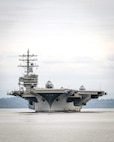 USS Ronald Reagan (CVN 76) prepares to enter Rich Passage Aug. 13, 2024, en route to Puget Sound Naval Shipyard & Intermediate Maintenance Facility in Bremerton, Washington. (U.S. Navy photo by Scott Hansen)