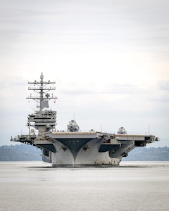 USS Ronald Reagan (CVN 76) prepares to enter Rich Passage Aug. 13, 2024, en route to Puget Sound Naval Shipyard & Intermediate Maintenance Facility in Bremerton, Washington. (U.S. Navy photo by Scott Hansen)