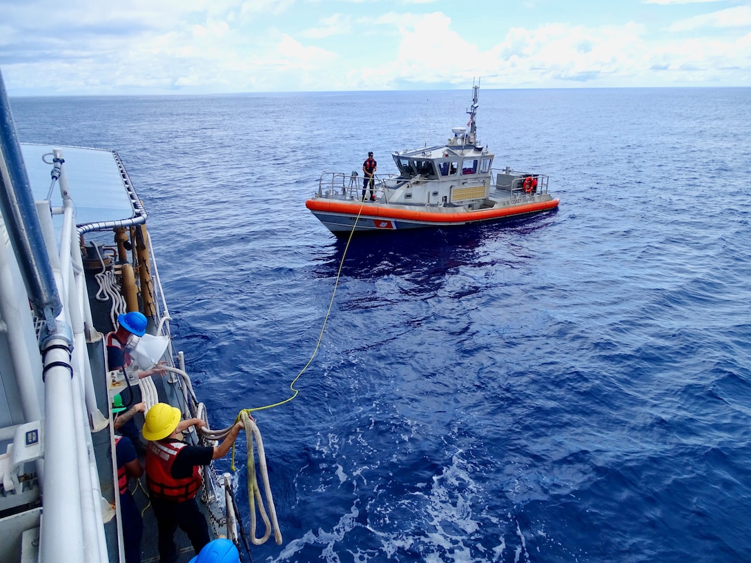 The crew of the USCGC Frederick Hatch (WPC 1143) conduct training with Station Apra Harbor in Apra Harbor on Aug. 8, 2024. The towing exercise with a Station Apra Harbor 45-foot Response Boat-Medium crew enhanced inter-unit coordination and operational proficiency. (U.S. Coast Guard photo)