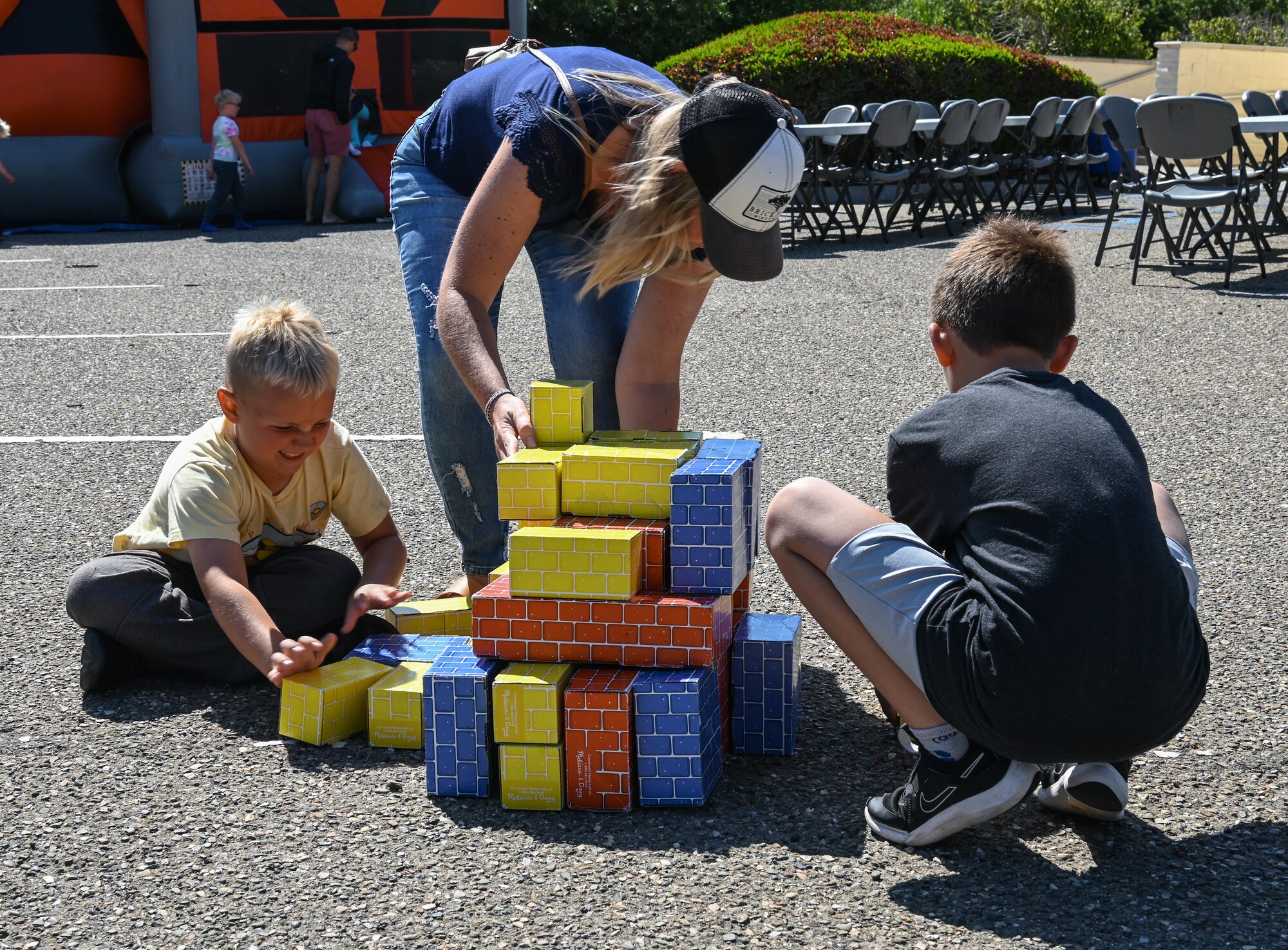 A family from the VSFB community plays with building blocks during the Vandenberg Chapel’s Fall Launch Party at Vandenberg Space Force Base.