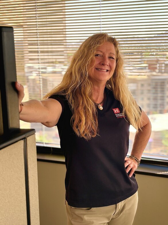 Therese Carpenter, regulatory project manager with the U.S. Army Corps of Engineers Los Angeles District, poses for a photo July 22 in the Phoenix Area Office. Carpenter holds a master’s in international environmental technology from Arizona State University.