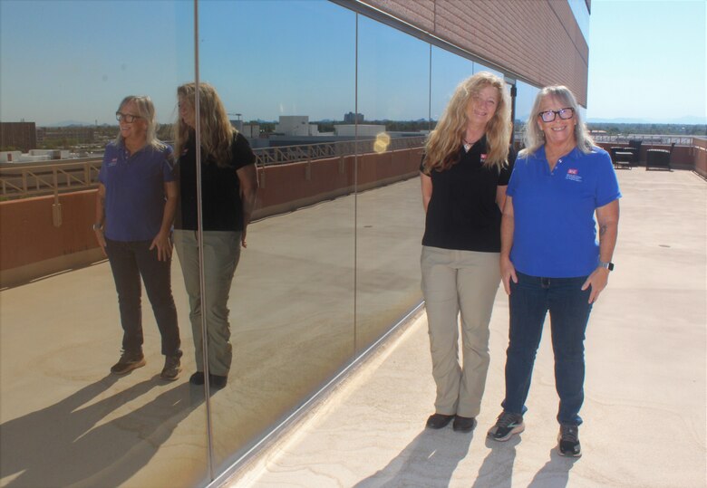 Los Angeles District Regulatory Division teammates Therese Carpenter and Lisa Robinson pose for a photo at the Phoenix Area Office July 22 in midtown Phoenix. Carpenter, a regulatory project manager, and Robinson, a regulatory assistant, discussed the positive impact district volunteers and donations have on charitable organizations in central Arizona.
