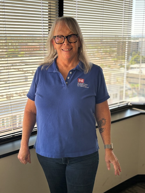 Los Angeles District’s Lisa Robinson, a regulatory assistant, poses for a photo July 22 in Phoenix after listing the positive impact LA District volunteers and donations have on charitable organizations in central Arizona. The Regulatory Division at the District’s Phoenix Area Office has consistently led district donation efforts for several Phoenix-area charities for more than seven years.