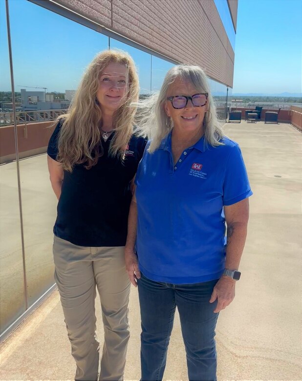 Los Angeles District Regulatory Division teammates Therese Carpenter and Lisa Robinson pose for a photo at the Phoenix Area Office July 22 in midtown Phoenix. Carpenter, a regulatory project manager, and Robinson, a regulatory assistant, discussed the positive impact district volunteers and donations have on charitable organizations in central Arizona.