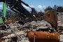 USACE contractors clearing wildfire ash and debris from a residential property in Lahaina, Hawaii.