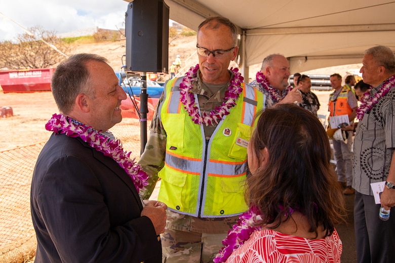 Hawaii Gov. Josh Green (front left) and First Lady Jaime Green (right) speak with Col. Eric Swenson, commander of the U.S. Army Corps of Engineers Recovery Field Office, following a ground blessing ceremony on Aug. 9. The ceremony marked the start of a sewer line project at the Kilohana Temporary Group Housing site in Lahaina, a significant infrastructure improvement for the community.