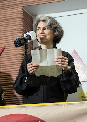 HOUSTON – (July 6, 2024) – U.S. Navy Lt. Anca Selariu, a microbiologist, assigned to Naval Medical Research Unit (NAMRU) San Antonio’s Craniofacial Health and Restorative Medicine Directorate, gives remarks after spending 378 days in Mars Dune Alpha, a 3D 1,700 square foot printed structure as part of NASA Crew Health and Performance Exploration Analog’s (CHAPEA) first mission located at Johnson Space Center. The CHAPEA missions, simulated expeditions to the surface of Mars, aim to collect critical data which will inform future human expeditions to space. NAMRU San Antonio’s mission is to conduct gap driven combat casualty care, craniofacial, and directed energy research to improve survival, operational readiness, and safety of DoD personnel engaged in routine and expeditionary operations. It is one of eight subordinate research commands in the global network of laboratories operating under the Naval Medical Research Command in Silver Spring, Md. (Courtesy photo/NASA)