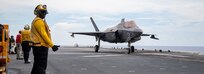 Sailors assigned to the forward-deployed amphibious assault ship USS America (LHA 6) prepare an F-35B Lightning II fighter aircraft from Marine Fighter Attack Squadron (VMFA) 121 for takeoff during flight operations in the Philippine Sea, August 23.