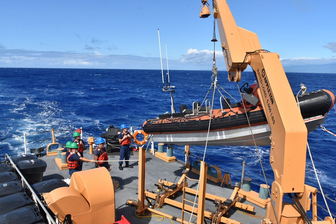 Crew members aboard U.S. Coast Guard Cutter Harriet Lane (WMEC 903) conduct single-point davit launch and recovery training while underway near Apia, Samoa, July 17, 2024. During their 68-day patrol in the South Pacific, the Harriet Lane crew traveled more than 13,400 nautical miles, made port calls in Tonga, American Samoa, the Cook Islands, and French Polynesia, and worked alongside Pacific Island partners to combat illegal fishing activities. (U.S. Coast Guard photo, courtesy Cutter Harriet Lane)