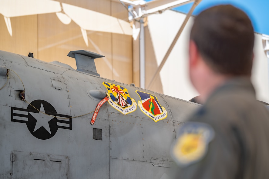 U.S. Air Force Reserve Citizen Airman Lt. Col. Timothy “Scream” Mitchell, an A-10 instructor pilot and flight commander with the 47th Fighter Squadron, looks on as he stands next to an A-10C Thunderbolt II at Davis-Monthan Air Force Base, Ariz., Aug. 22, 2024. Mitchell’s career is a testament to the A-10’s role in providing close air support for the U.S. military. (U.S. Air Force photo by Tech. Sgt. Tyler J. Bolken)