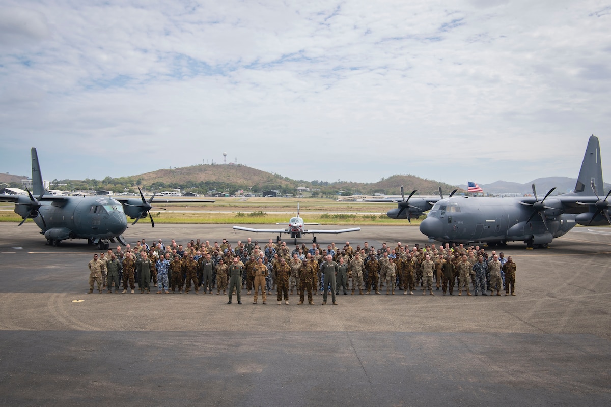 U.S. Air Force, Royal Australian Air Force, French Air Force and Papua New Guinea Defence Force personnel participating in Pacific Angel 24-1pose for a group photo at Port Moresby, Papua New Guinea, August 24, 2024.