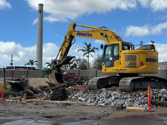 A debris crew works to remove debris from the last multi-unit residential property, The Spinnaker condominiums, in the U.S. Army Corps of Engineers' debris removal program, August 26, 2024. The completion of all residential debris removal in Lahaina is expected in the coming weeks, just over a year after the August 2023 wildfires destroyed more than 2,200 structures. (U.S. Army Corps of Engineers photo by Susan Lee)