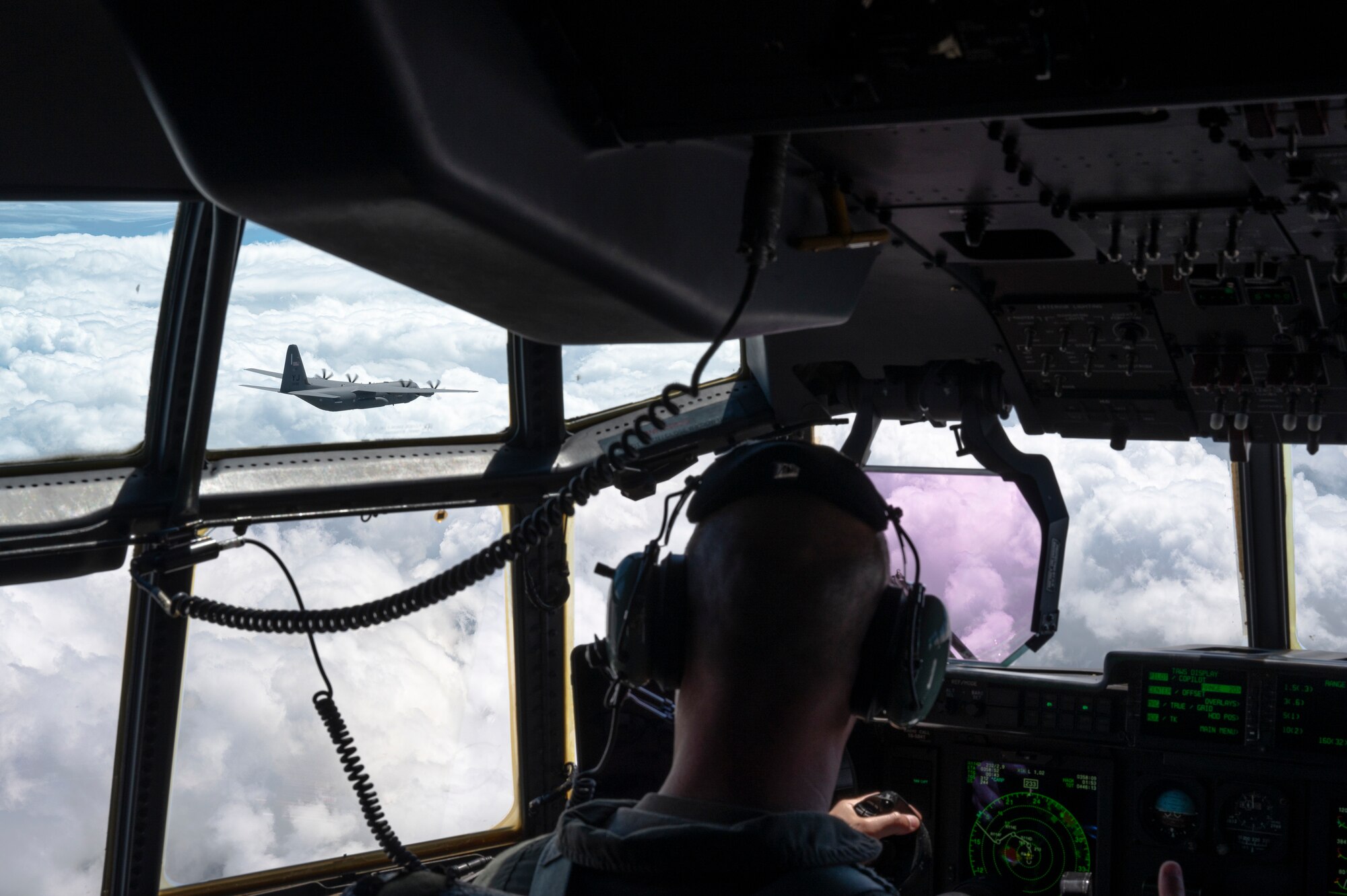 The 374th Airlift Wing commander pilots an aircraft near Mount Fuji.