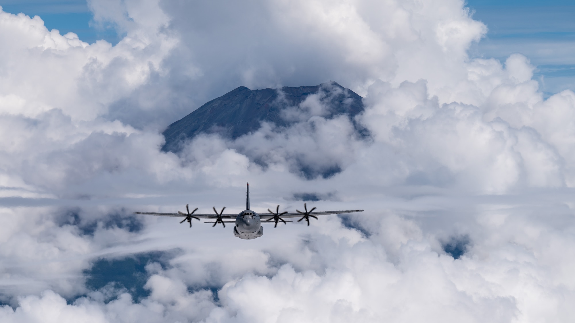 A U.S. Air Force C-130J Super Hercules assigned to the 36th Airlift Squadron flies near Mount Fuji, Japan.