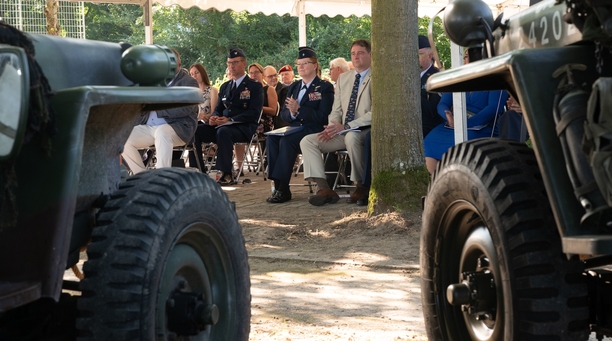 people watch a memorial service