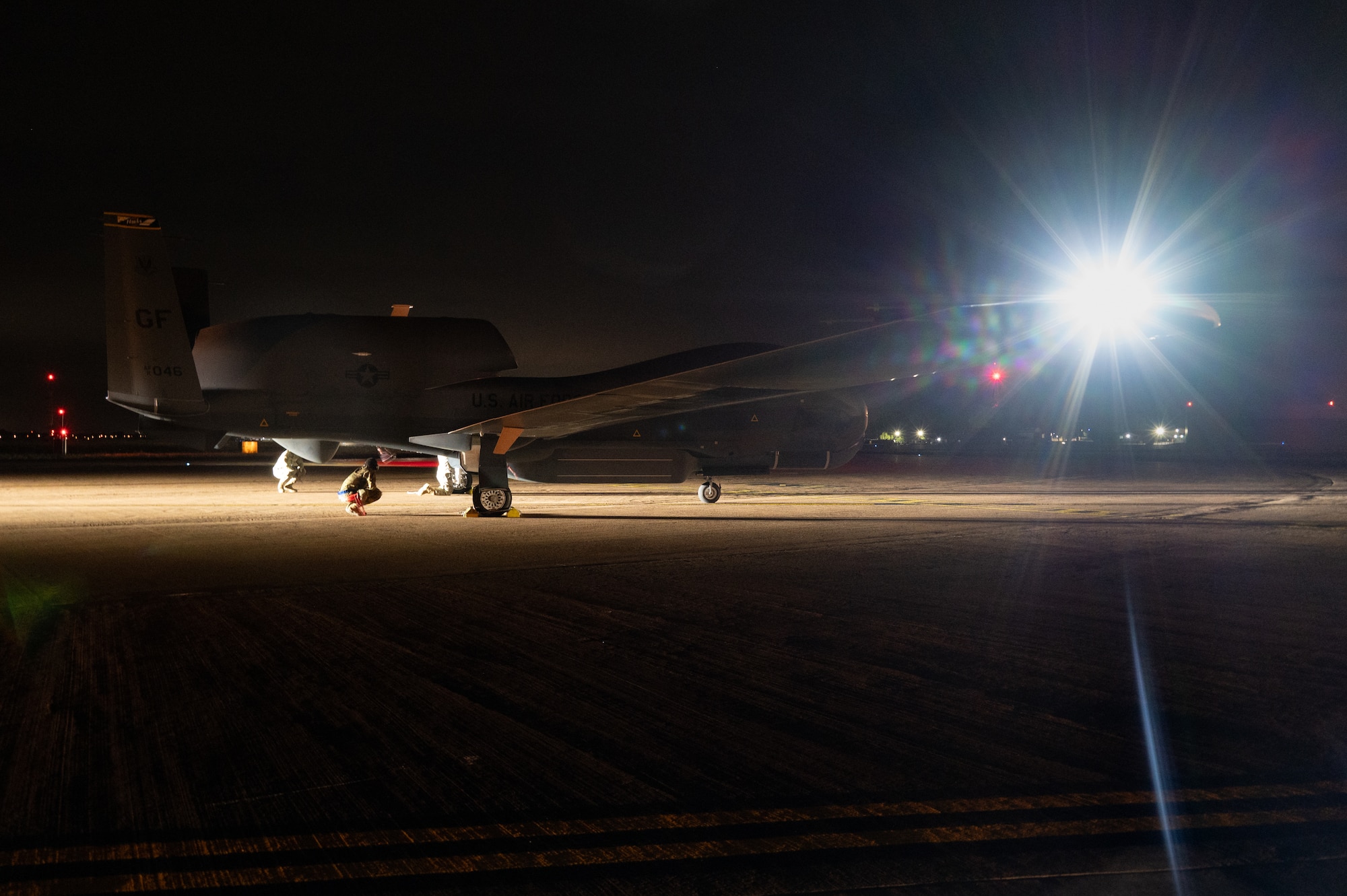 Maintenance technicians recover an RQ-4B Global Hawk assigned to Grand Forks Air Force Base’s 319th Reconnaissance Wing at RAF Fairford.