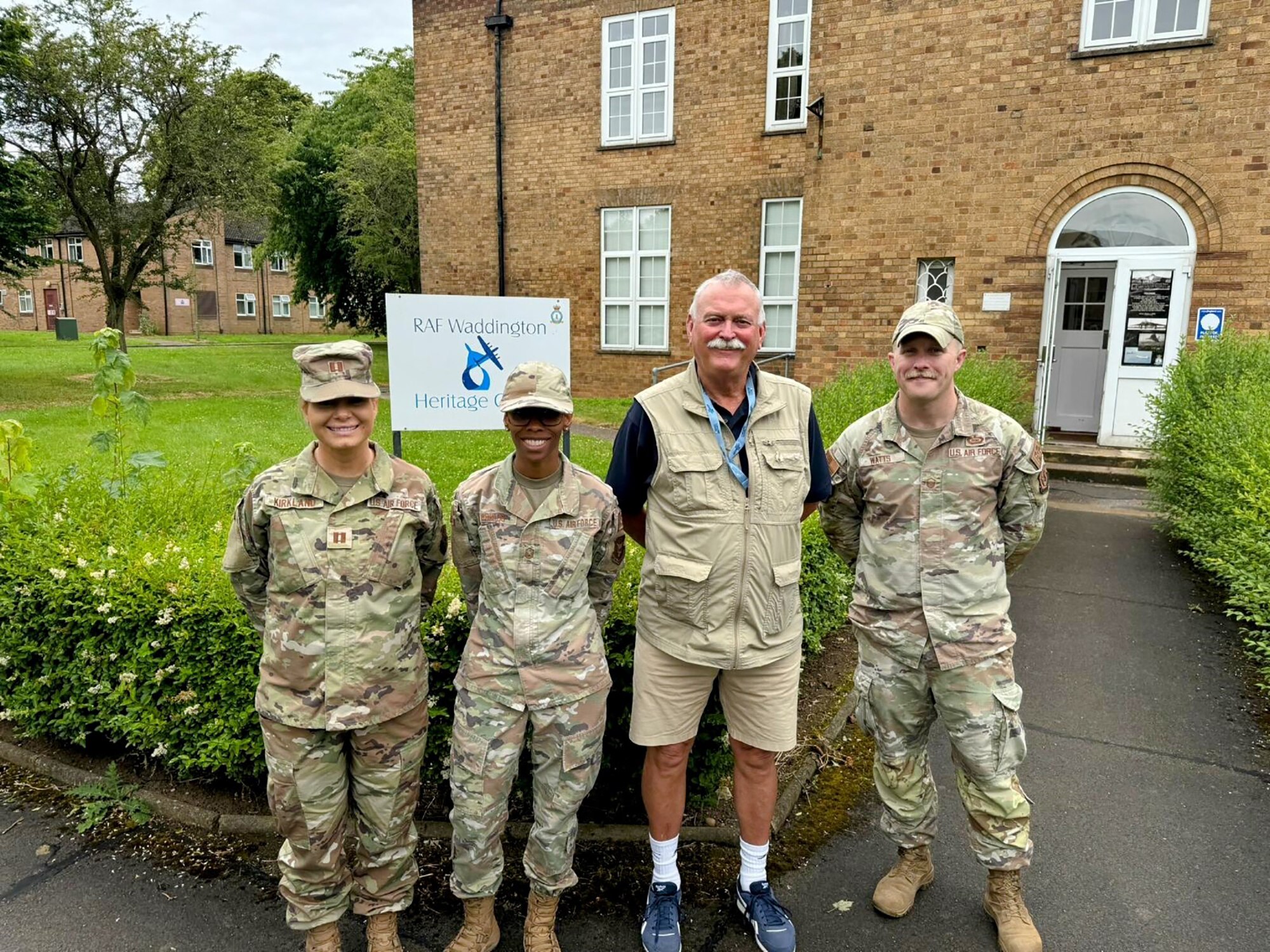 From left, Capt. Dara Kirkland, 63rd Intelligence Squadron (IS) flight commander, Master Sgt. Latoria Worlds, 42nd IS readiness superintendent, ex- Royal Auxiliary Air Force (RAuxAF) Sgt. Phil Doorbar, who is now Waddington Heritage Center guide, and Master Sgt. Ryan Watts, 23rd IS flight chief, pose in front of the heritage center July 3, 2024, as part of a Military Reserve Exchange Program visit. RAuxAF units hosted a team from the 655th Intelligence, Surveillance and Reconnaissance (ISR) Wing July 1-12 to share lessons learned about mission, operations, structure, capabilities and tactics. (Courtesy Photo)