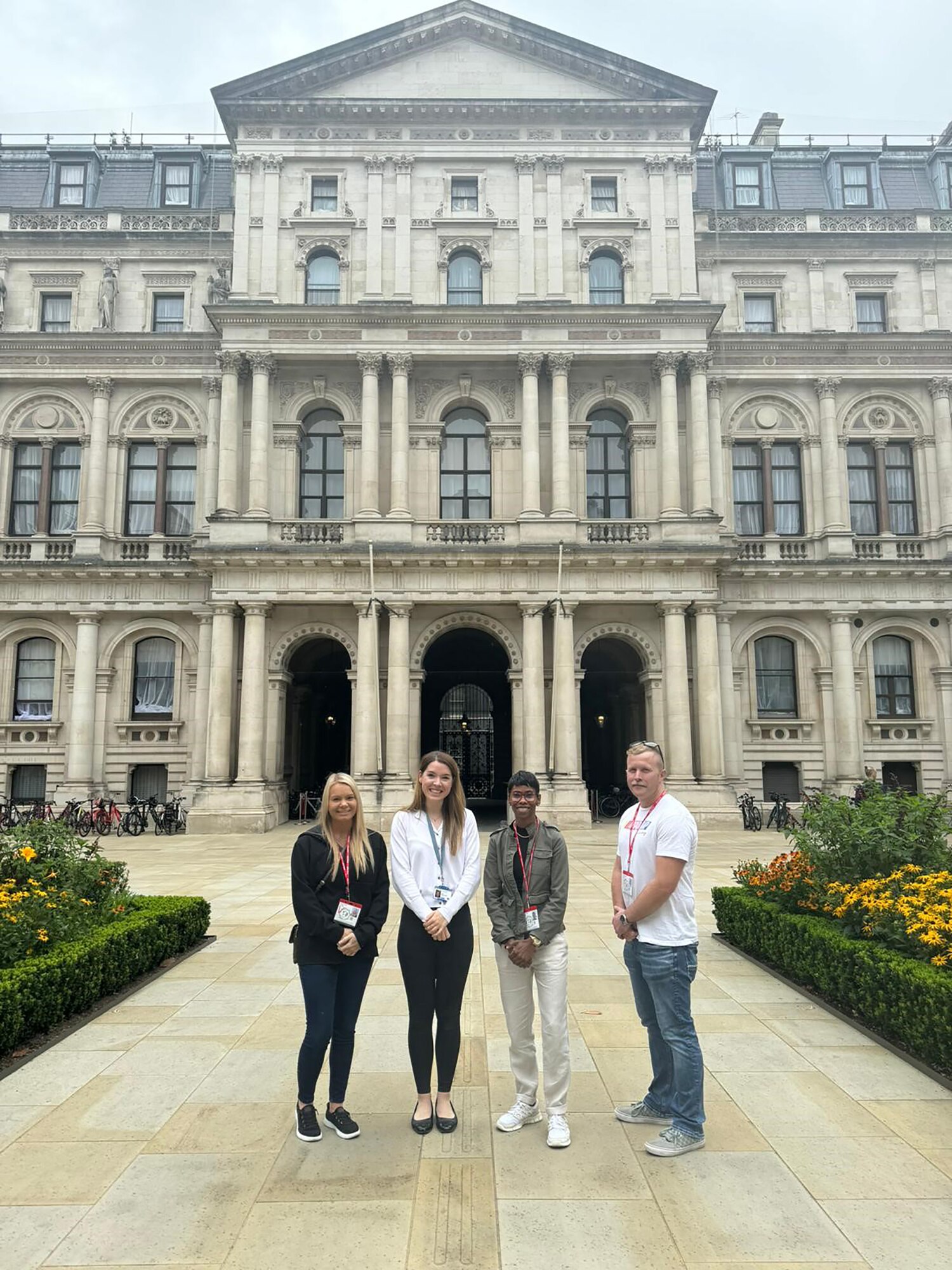 From left, Capt. Dara Kirkland, 63rd Intelligence Squadron (IS) flight commander, Royal Air Force (RAF) Air Recruit Lucy Perry-Jones, Master Sgt. Latoria Worlds, 42nd IS readiness superintendent, and Master Sgt. Ryan Watts, 23rd IS flight chief pose in front of the Foreign, Commonwealth, and Development Office in London July 15, 2024, as part of a Military Reserve Exchange Program visit. Royal Auxiliary Air Force (RAuxAF) units hosted a team from the 655th Intelligence, Surveillance and Reconnaissance (ISR) Wing July 1-12 to share lessons learned about mission, operations, structure, capabilities and tactics. (Courtesy Photo)