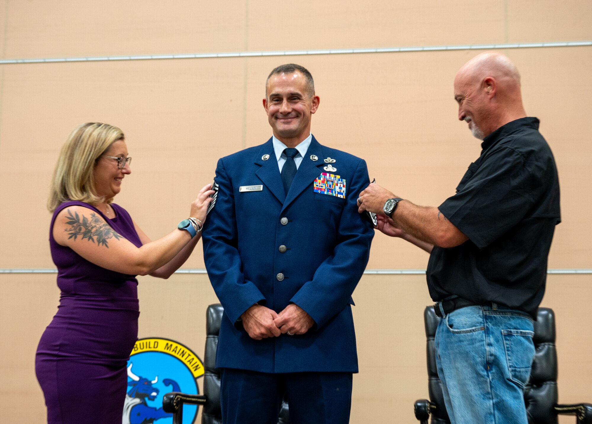 Airman is promoted.