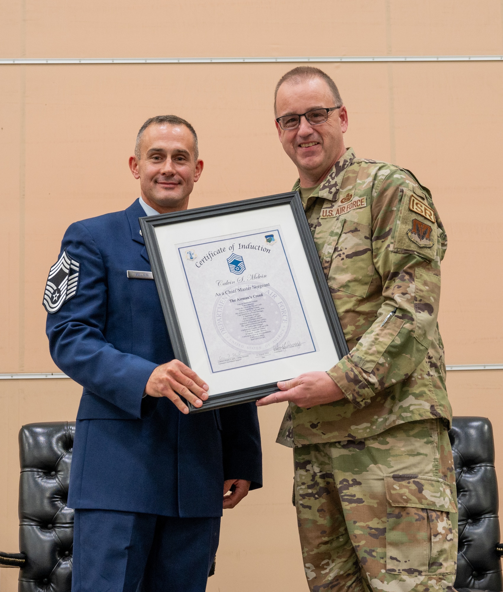 Chief Master Sgt. poses for photo