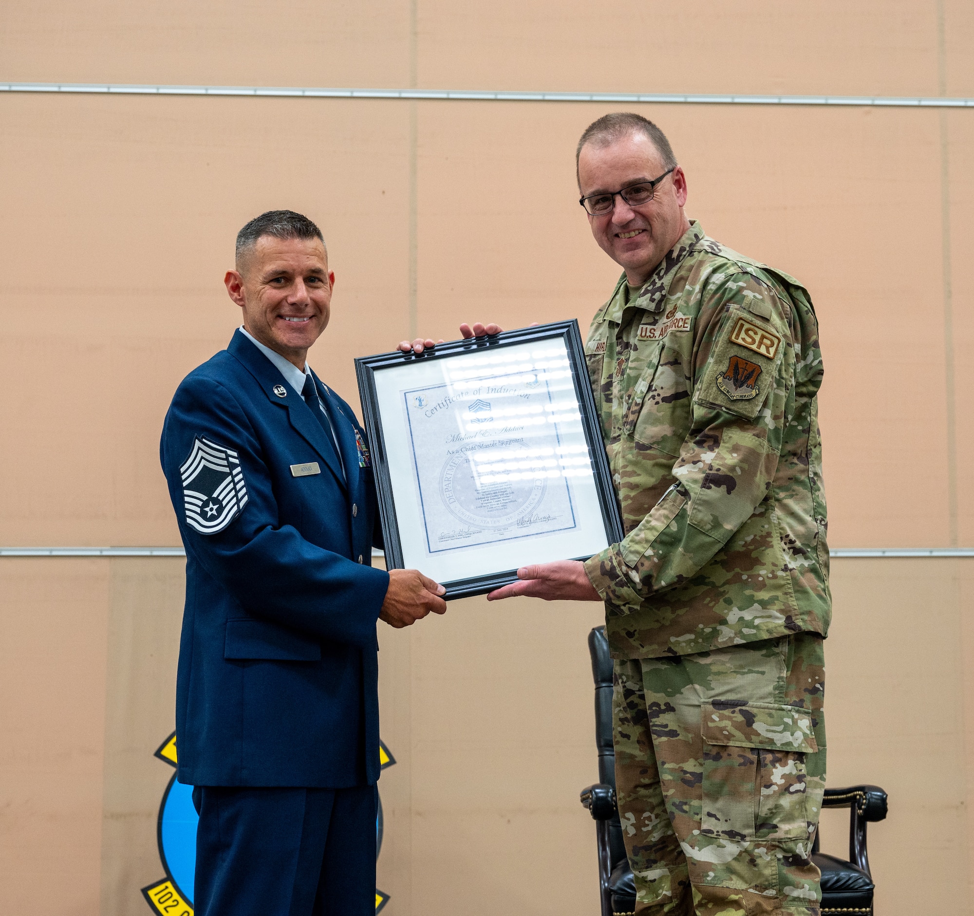 Airman receives an award.