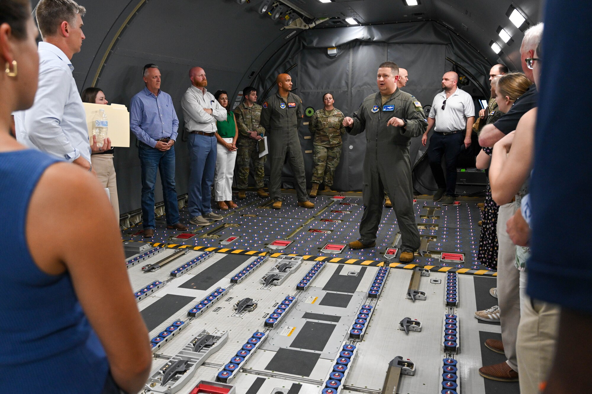 U.S. Air Force Lt. Col. Peter Culbert, 56th Air Refueling Squadron (ARS) commander, speaks to U.S. Congressional staff delegates in a KC-46 Pegasus at Altus Air Force Base, Oklahoma, Aug. 21, 2024. 97th Maintenance Squadron members and 56th ARS leadership discussed the aircraft’s capabilities along with efforts to address manning and facility renovations. (U.S. Air Force photo by Senior Airman Miyah Gray)
