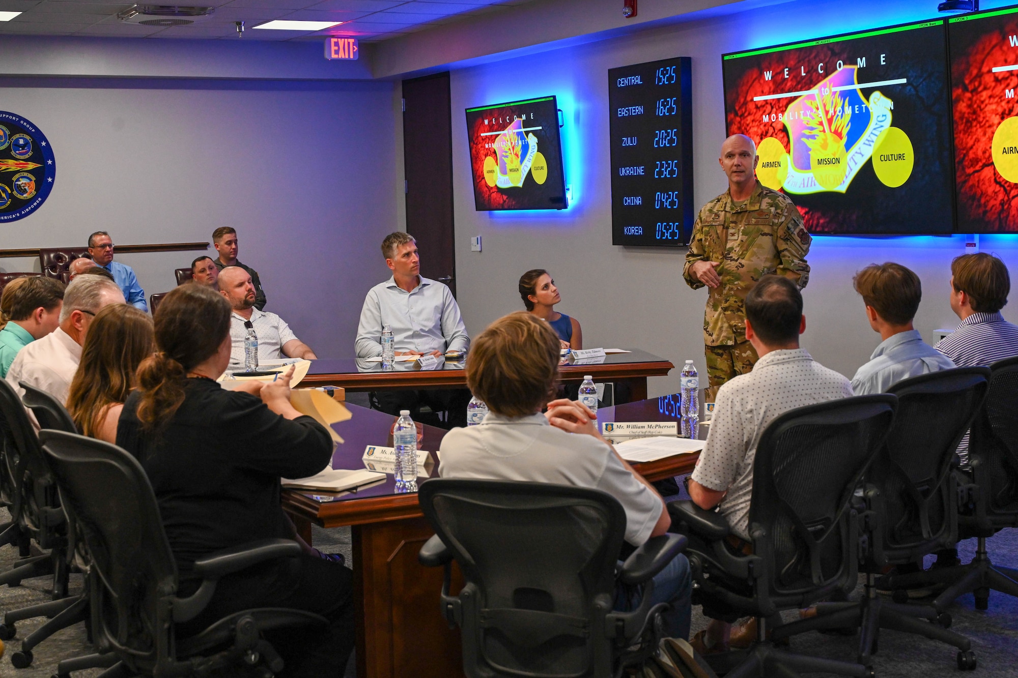 U.S. Air Force Col. Jeff Marshall, 97th Air Mobility Wing commander, gives a mission brief to U.S Congressional staff delegates and members of the Oklahoma delegation at Altus Air Force Base (AFB), Oklahoma, Aug. 21, 2024. During the brief, Marshall emphasized the role that Altus AFB plays in training mobility Airmen. (U.S. Air Force photo by Senior Airman Miyah Gray)