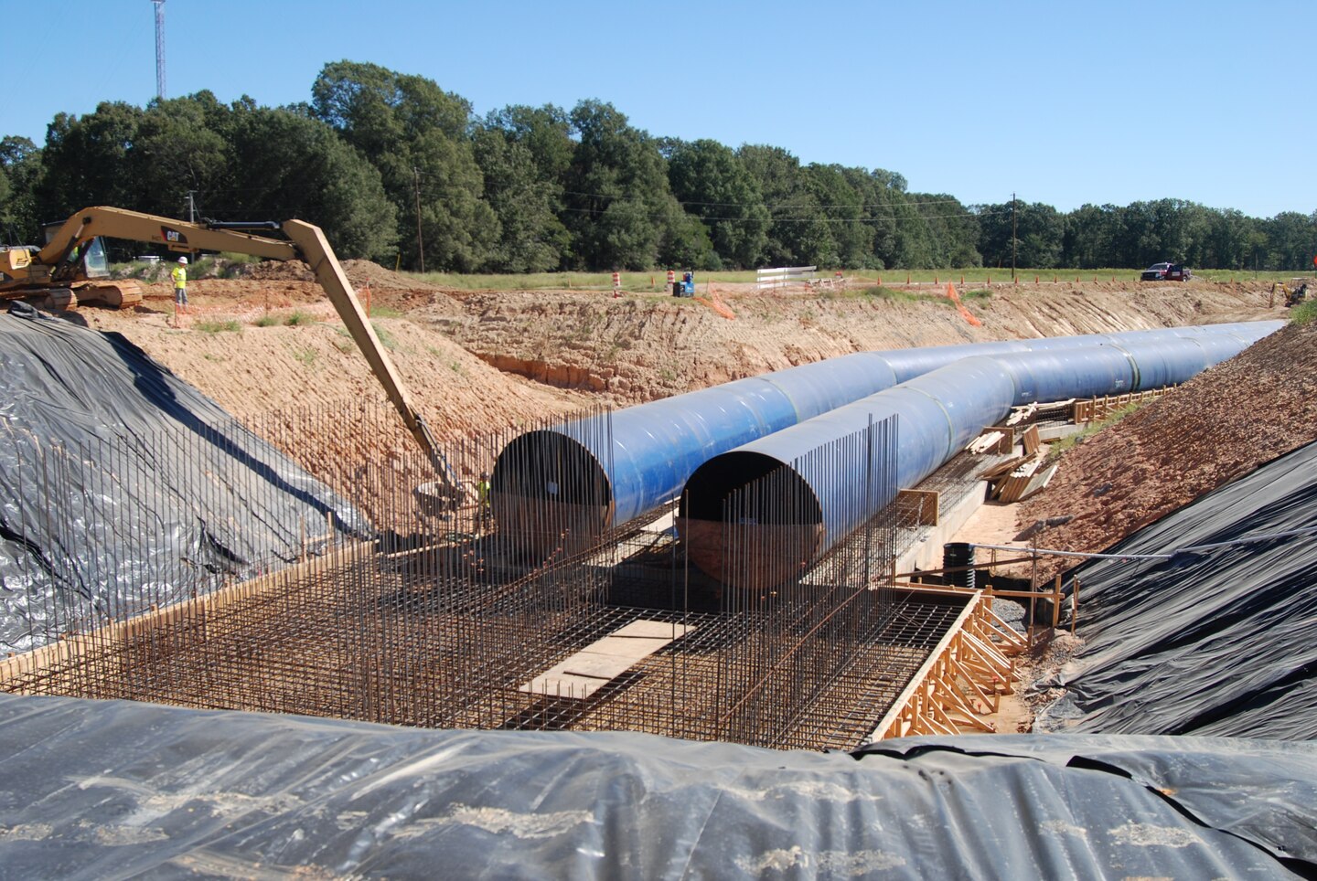 In 2016 the Memphis District constructed the project’s widened canal reservoir that will regulate the water levels and reduce wave action in the downstream irrigation canals due to differential water levels caused by the operation of the Grand Prairie pumping station that pulls surface water from the White River. The widened canal reservoir will then deliver the surface water through a series of canals, for distribution to the various on-farm reservoirs.  The on-farm reservoirs will then be used to supplement the farmers irrigation needs for their crops such as rice.