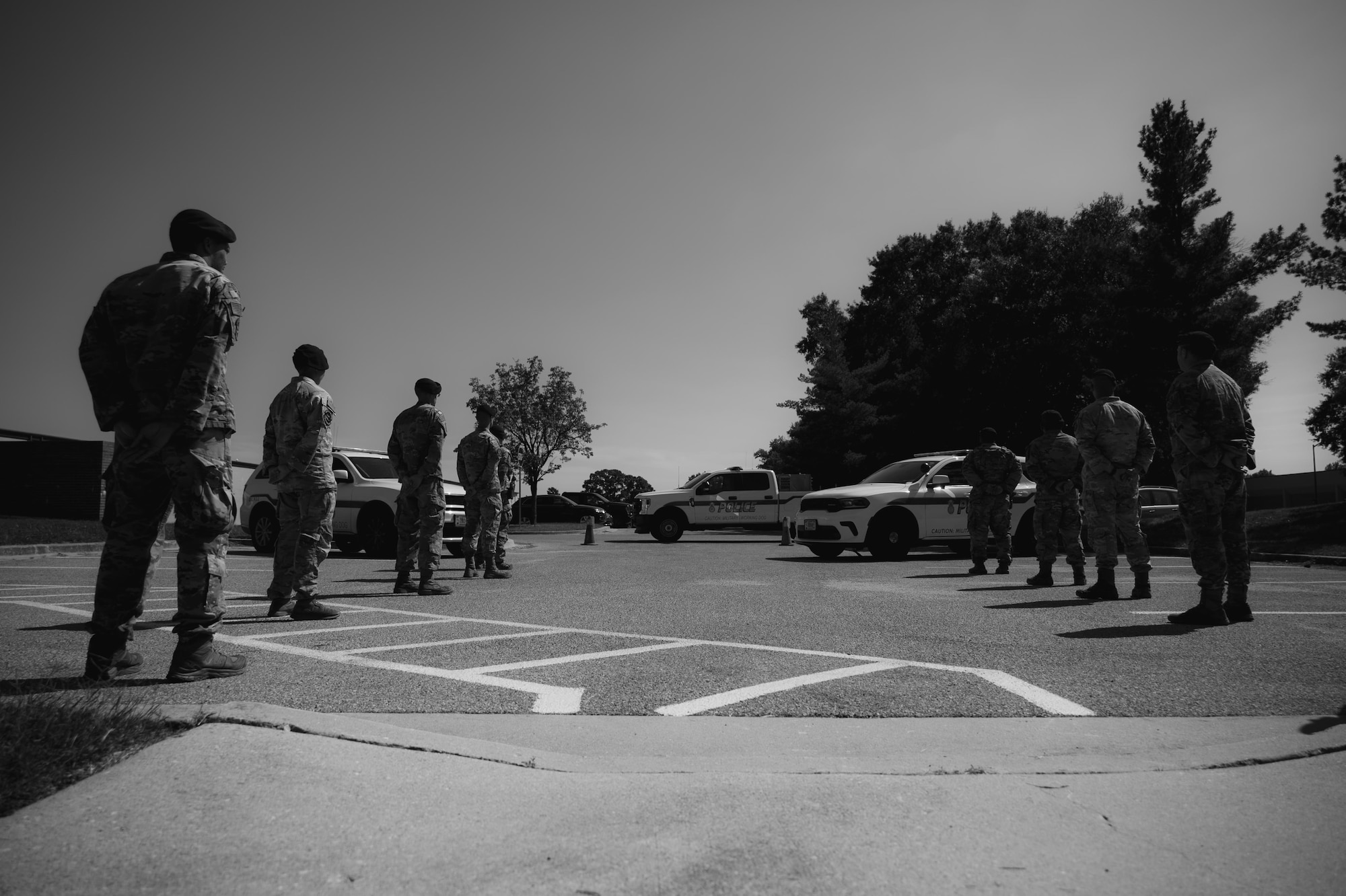 Members of the Security Support Squadron stand at parade rest to honor Hugo.