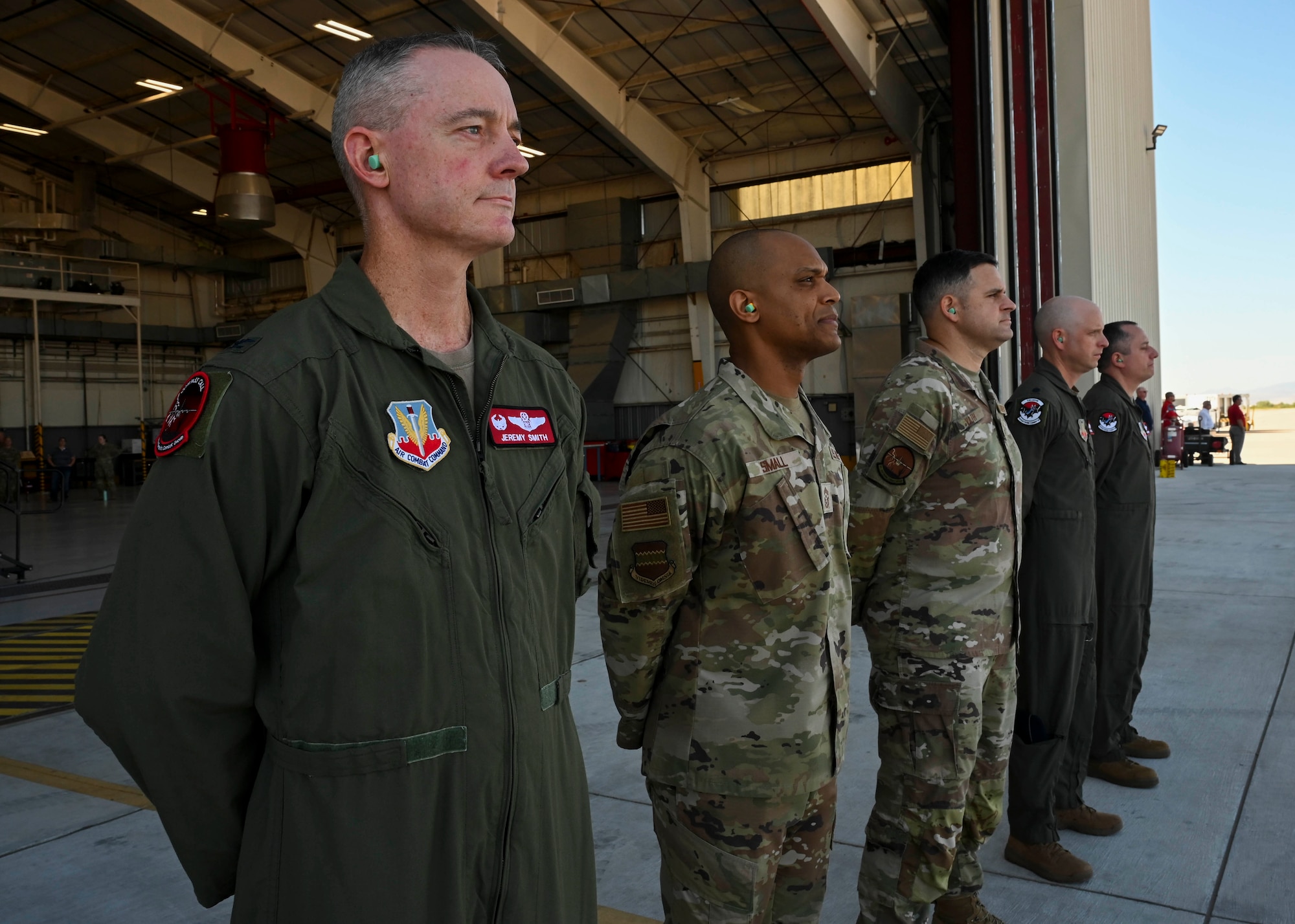 55th Wing, 55th Electronic Combat Group, and 43rd Electronic Combat Squadron leadership stand ready to receive Air Combat Command’s first EA-37B Compass Call aircraft