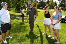 U.S. Air Force Col. Keagan McLeese, 9th Reconnaissance Wing commander, talks to 9th RW Airmen competing in the annual Patriotic Golf Tournament in Marysville, California, Aug. 23, 2024.