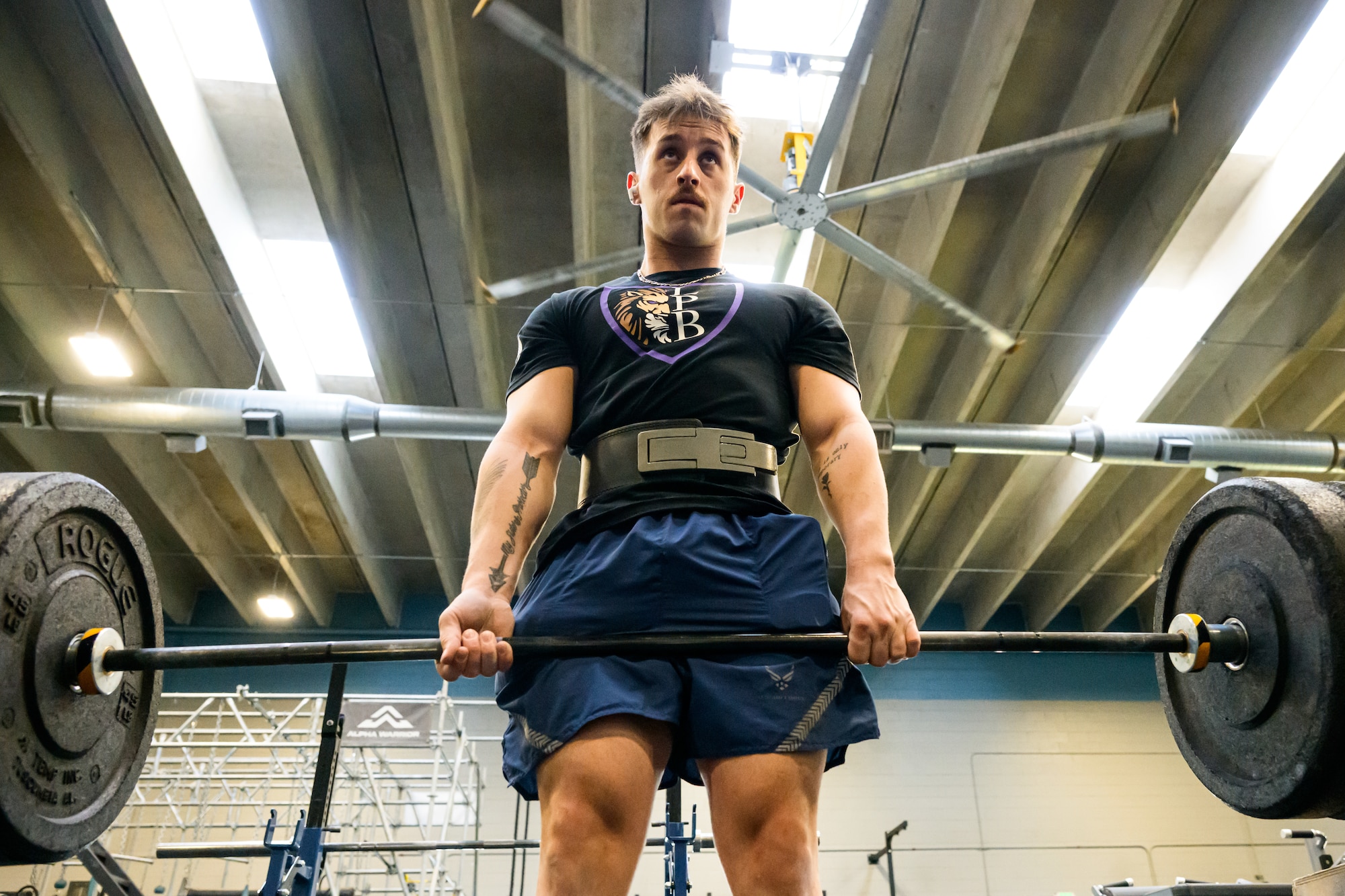 Senior Airman Brandon Higgins, 388th Maintenance Group, works out with weights at Hill Air Force Base. Higgins is preparing to compete in the World Powerlifting Congress World Cup. (U.S. Air Force photo by R. Nial Bradshaw)