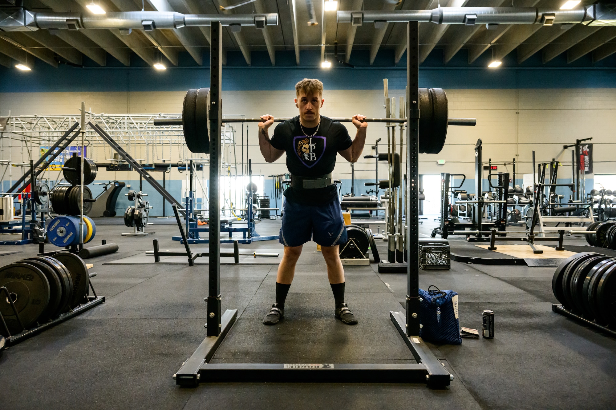 Senior Airman Brandon Higgins, 388th Maintenance Group, works out with weights at Hill Air Force Base. Higgins is preparing to compete in the World Powerlifting Congress World Cup. (U.S. Air Force photo by R. Nial Bradshaw)